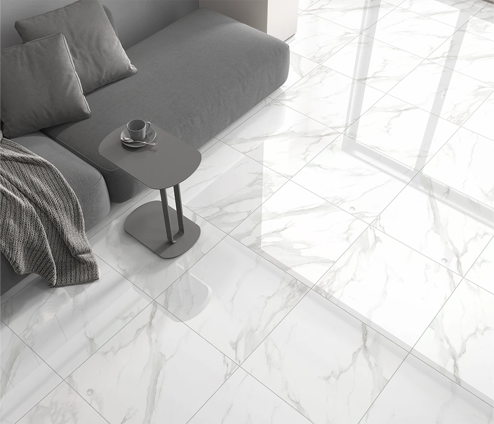 Carrara marble 600x600mm rectified edge porcelain tiles on a living room floor.
