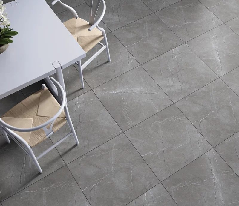 grey marble effect tiles on a dining room floor. The tiles are a 600x600mm rectified edge porcelain called Arctic.